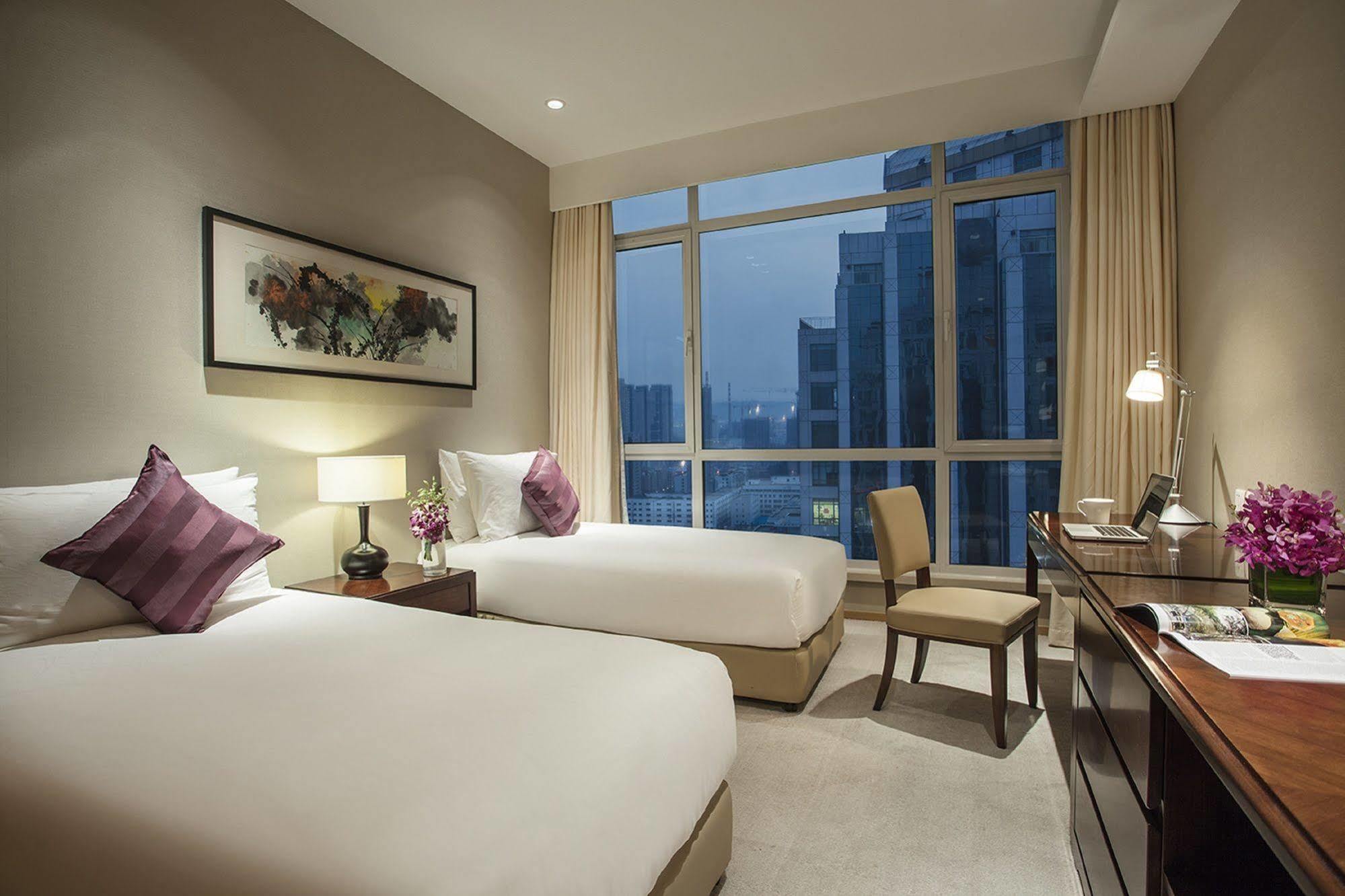 ซอเมอร์เซ็ท แกรนด์ เซ็นทรัล ตาเหลียน Apartment ต้าเหลียน ภายนอก รูปภาพ